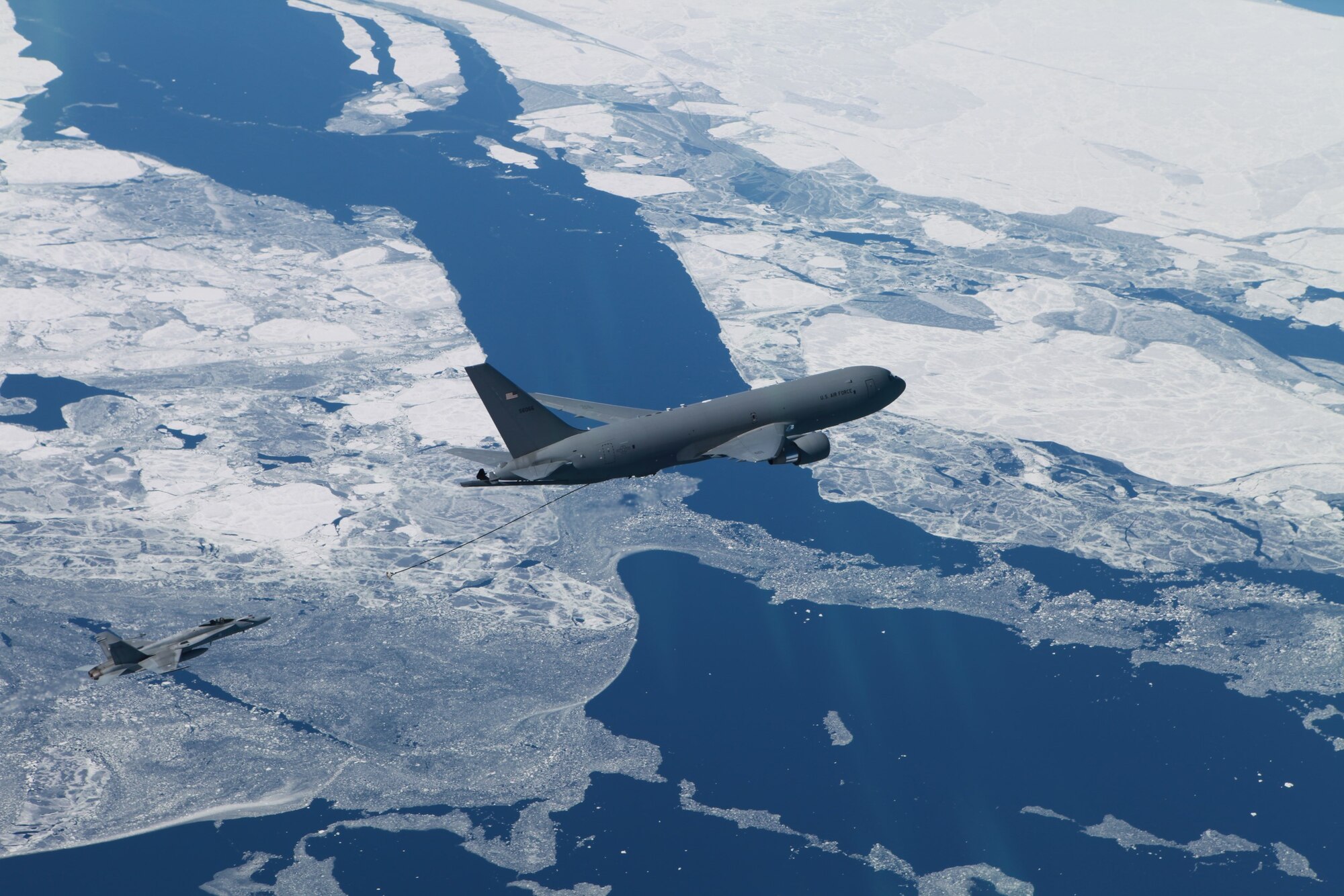 A U.S. KC-46A Pegasus tanker aircraft from the Air Force Reserve Command’s 931st Air Refueling Wing, primarily stationed at McConnell Air Force Base, Kansas, refuels Finnish F/A-18s, April 13, 2023.