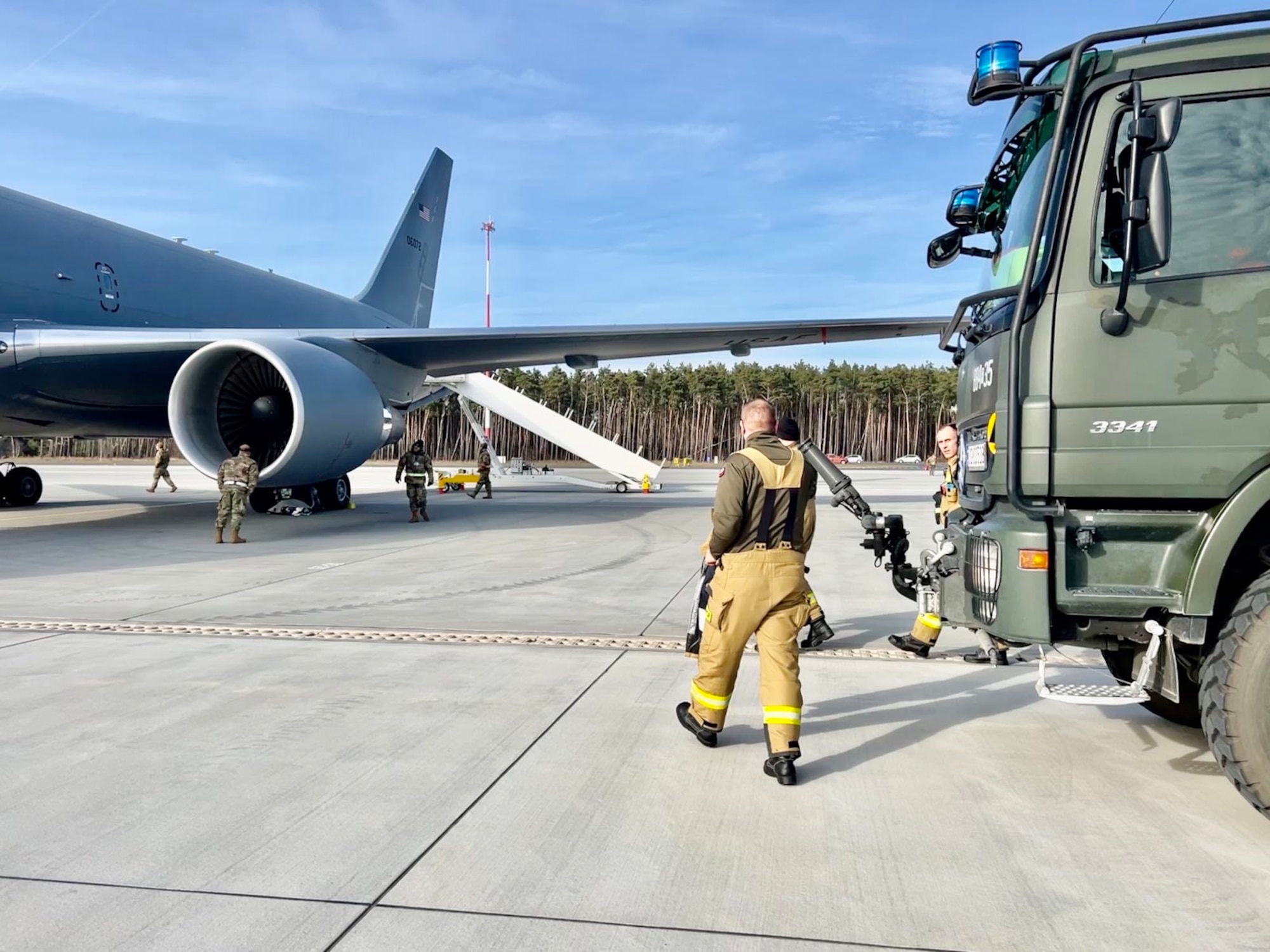A Polish Fire Brigade at Powidz Air Base, Poland train U.S. KC-46A Pegasus tanker crew from the 514th Air Mobility Wing, primarily stationed at McGuire Air Force Base, N.J.