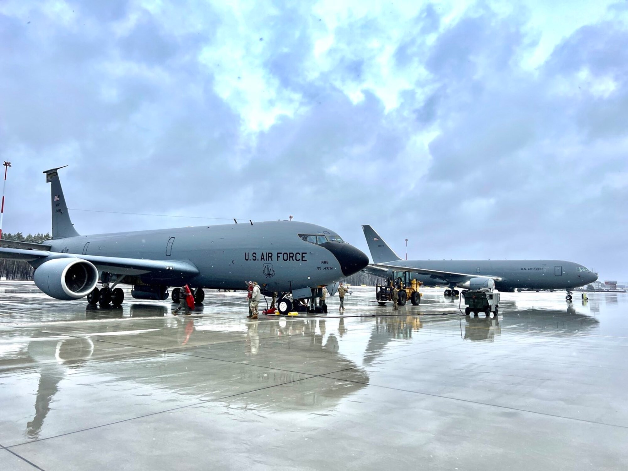 A U.S. KC-46A Pegasus tanker aircraft from the Air Force Reserve Command’s 514th Air Mobility Wing, primarily stationed at McGuire Air Force Base, N.J., and a U.S. KC-135 Stratotanker from the 186th Air Refueling Wing, part of the Mississippi Air National Guard, sit on the runway at Powidz Air Base, Poland, March 16, 2023.