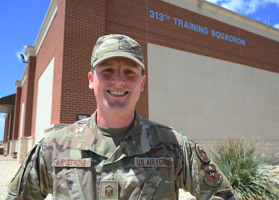 U.S. Air Force Master Sgt. Chris Armstrong, 313th Training Squadron Flight Chief, smiles at Goodfellow Air Force Base, Texas, April 10, 2023. Armstrong has been enlisted in the Air Force for 18 years. (U.S. Air Force photo by Airman 1st Class Madison Collier)