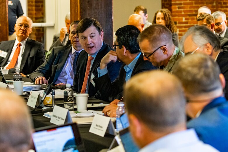 Damon Judd, President and CEO of the Marquette Transportation Company, gives his opening remarks during the Inland Waterways Users Board meeting in Pittsburgh, April 13, 2023.

The U.S. Army Corps of Engineers Pittsburgh District hosted the tour and several briefings about ongoing and future inland navigation construction projects within the district.

During the tour, Inland Waterways User Board (IWUB) members learned about the overall Lower Monongahela River navigation project and the new river chamber construction at Charleroi, which is in its final phase after nearly 20 years of construction. Members also listened to briefings about the overall Upper Ohio navigation project and its first major construction contract, the new Montgomery lock construction. 

IWUB is an industry federal-advisory committee representing all fuel-taxed inland waterway systems within the United States. The navigation industry contributes to the Inland Waterways Trust Fund through fuel taxes paid by carriers who transport bulk commodities on the inland waterway system. The board makes recommendations to Congress and the Assistant Secretary of the Army for Civil Works on how best to invest federal and trust funds dollars to keep the most cost-effective, environmentally friendly, and safest form of transportation for bulk commodities resilient and reliable.
(U.S. Army Corps of Engineers Pittsburgh District photo by Michel Sauret)