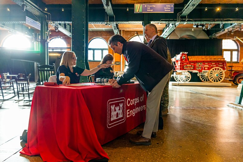 Members of the Inland Waterways Users Board and U.S. Army Corps of Engineers Pittsburgh District check in for a board meeting in Pittsburgh, April 13, 2023.

The U.S. Army Corps of Engineers Pittsburgh District hosted the tour and several briefings about ongoing and future inland navigation construction projects within the district.

During the tour, Inland Waterways User Board (IWUB) members learned about the overall Lower Monongahela River navigation project and the new river chamber construction at Charleroi, which is in its final phase after nearly 20 years of construction. Members also listened to briefings about the overall Upper Ohio navigation project and its first major construction contract, the new Montgomery lock construction. 

IWUB is an industry federal-advisory committee representing all fuel-taxed inland waterway systems within the United States. The navigation industry contributes to the Inland Waterways Trust Fund through fuel taxes paid by carriers who transport bulk commodities on the inland waterway system. The board makes recommendations to Congress and the Assistant Secretary of the Army for Civil Works on how best to invest federal and trust funds dollars to keep the most cost-effective, environmentally friendly, and safest form of transportation for bulk commodities resilient and reliable.
(U.S. Army Corps of Engineers Pittsburgh District photo by Michel Sauret)