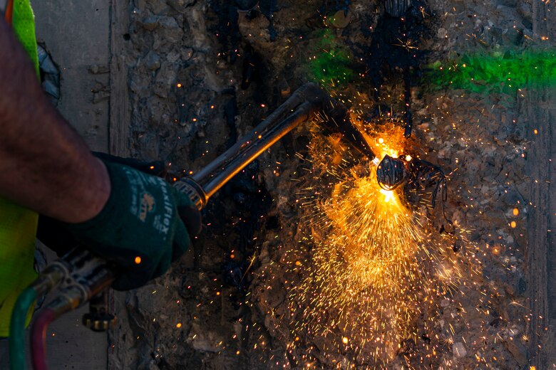 Matt Wilson, a laborer, uses a torch to cut off rebar protruding out of a concrete wall at a construction site for the new river chamber at the Monongahela River Locks and Dam 4 in Charleroi, Pennsylvania, April 12, 2023.

The U.S. Army Corps of Engineers Pittsburgh District hosted the tour and several briefings about ongoing and future inland navigation construction projects within the district.

During the tour, Inland Waterways User Board (IWUB) members learned about the overall Lower Monongahela River navigation project and the new river chamber construction at Charleroi, which is in its final phase after nearly 20 years of construction. Members also listened to briefings about the overall Upper Ohio navigation project and its first major construction contract, the new Montgomery lock construction. 

IWUB is an industry federal-advisory committee representing all fuel-taxed inland waterway systems within the United States. The navigation industry contributes to the Inland Waterways Trust Fund through fuel taxes paid by carriers who transport bulk commodities on the inland waterway system. The board makes recommendations to Congress and the Assistant Secretary of the Army for Civil Works on how best to invest federal and trust funds dollars to keep the most cost-effective, environmentally friendly, and safest form of transportation for bulk commodities resilient and reliable.
(U.S. Army Corps of Engineers Pittsburgh District photo by Michel Sauret)