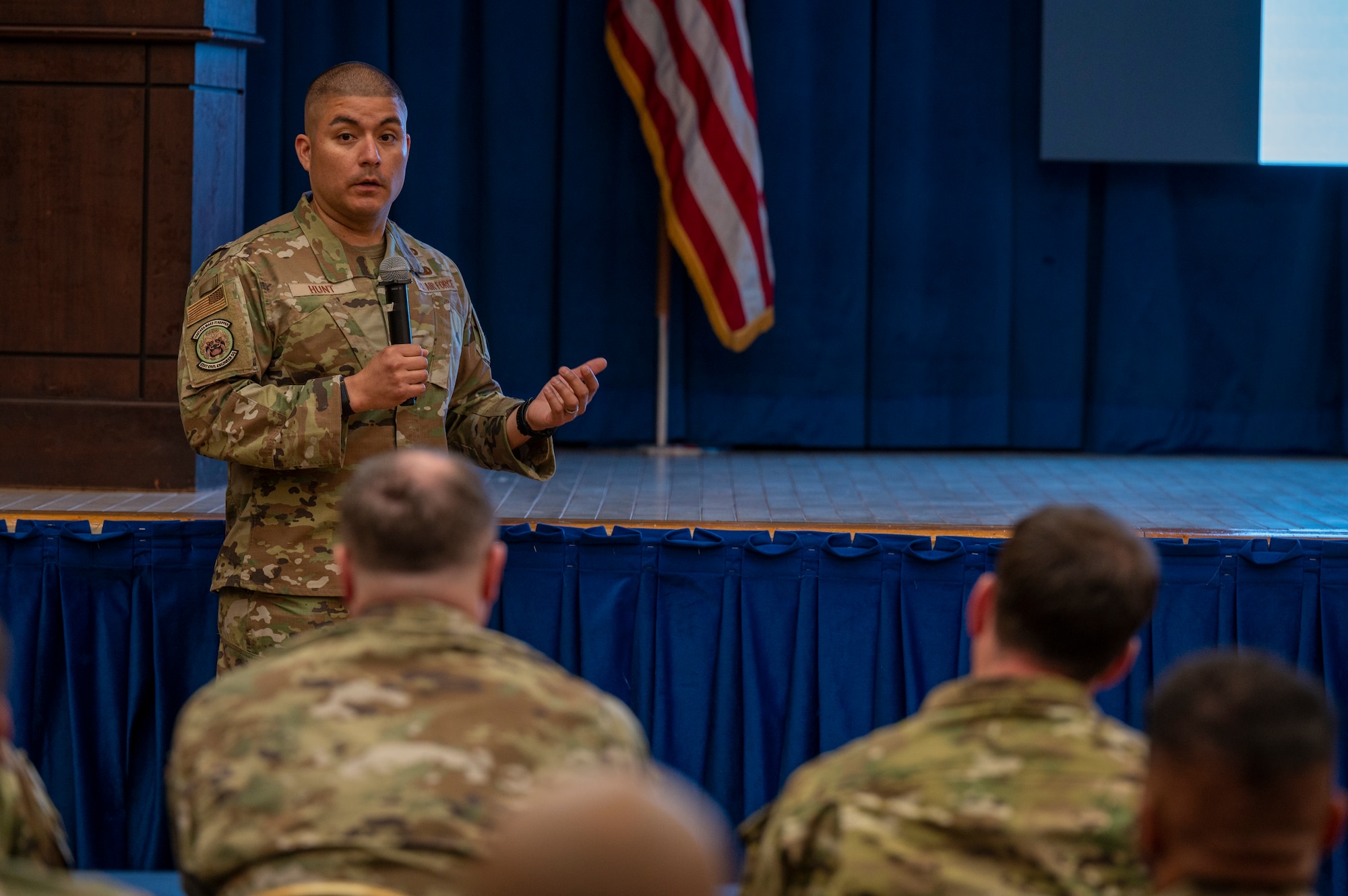 U.S. Air Force Senior Master Sgt. Joseph Hunt, 51st Civil Engineer Squadron first sergeant, presents slides to students attending the First Sergeant’s Symposium at Osan Air Base, Republic of Korea, April 17, 2023. First sergeants play a crucial role in ensuring the health, morale, welfare, and quality of life of Airmen and their families to guarantee unit readiness and mission success. (U.S. Air Force photo by Airman 1st Class Aaron Edwards)