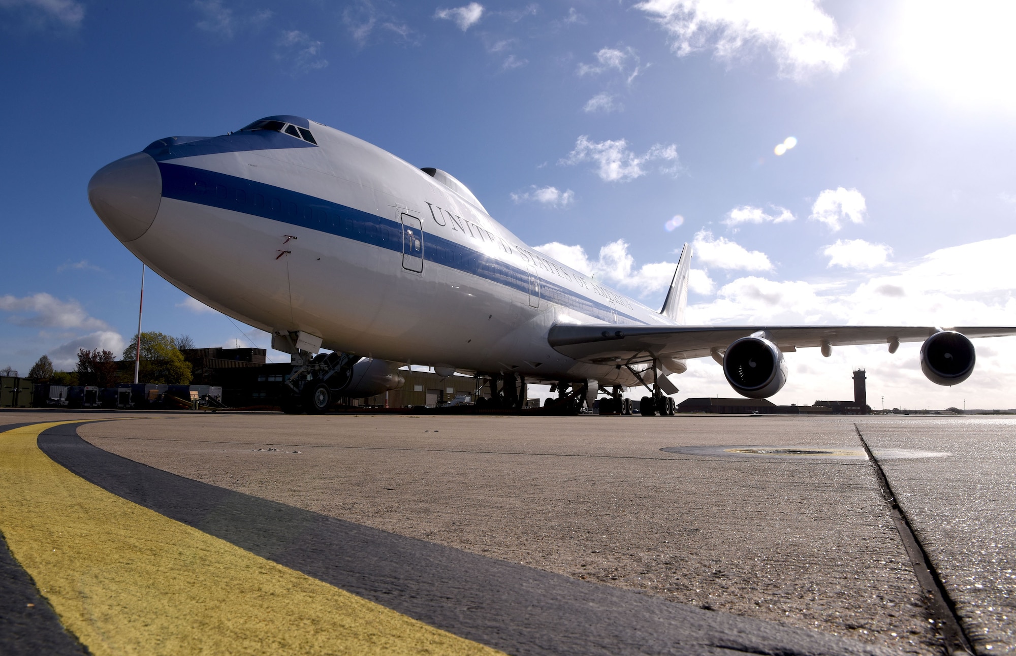 An E-4B National Airborne Operations Center stands ready at Royal Air Force Mildenhall, England, April 12, 2023. The NAOC aircraft has several missions, both operational and training, which require travel to a wide variety of locations, both within the United States and around the world. (U.S. Force photo by Karen Abeyasekere/This image has been altered for security purposes).
