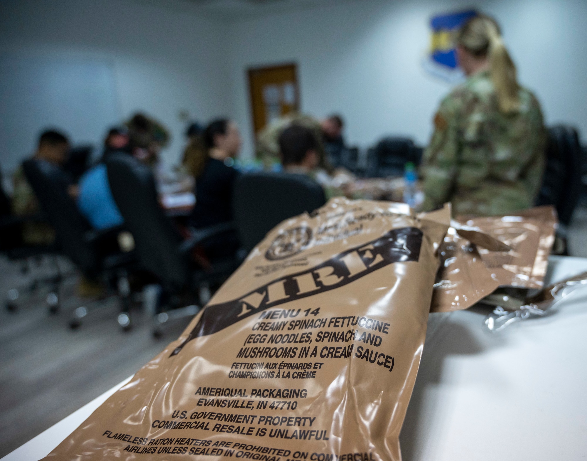 U.S. Air Force Airmen from the 386th Expeditionary Medical Squadron food inspection team and U.S. Army Soldiers from the 109th Medical Detachment Veteran Support Squadron test Meals Ready to Eat for quality and freshness at Ali Al Salem Air Base, Kuwait, April 5, 2023.