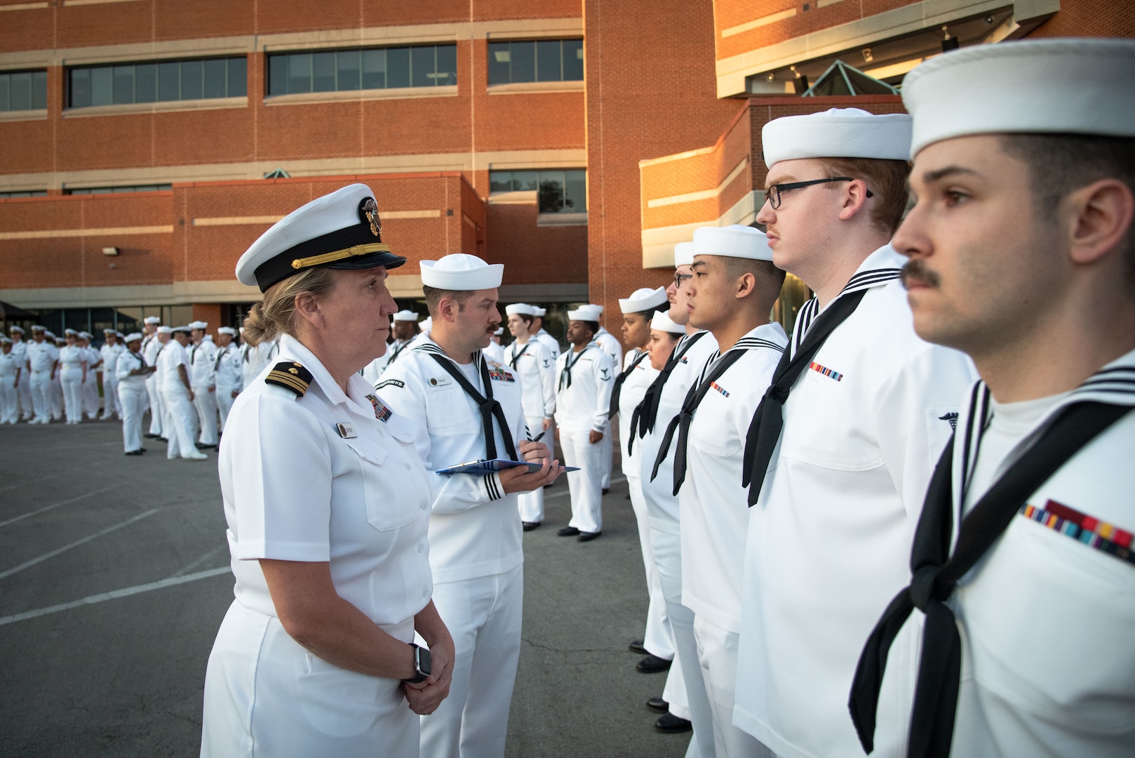 Lt. Cmdr. Amy Zaycek, left, and Hospital Corpsman First Class Garett Fralix, center, inspect the Summer Dress White uniforms of Sailors assigned to Naval Health Clinic Cherry Point during an inspection conducted Thursday, April 20.  

The inspection provided an opportunity for Sailors to participate in a Navy tradition, demonstrate attention to detail and celebrate the coming summer season.