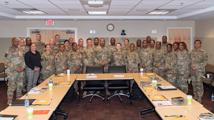 Participants pose for a group photo during the Finance and Comptroller Corps Sergeant Major Symposium at the Pentagon, March 15, 2023. The three-day symposium offered an opportunity for OASA (FM&C) leaders and others to meet with the senior noncommissioned officers, and discuss items such as the Army budget process, financial information systems, the Army audit and workforce development. (U.S. Army photo by Laura Buchta)