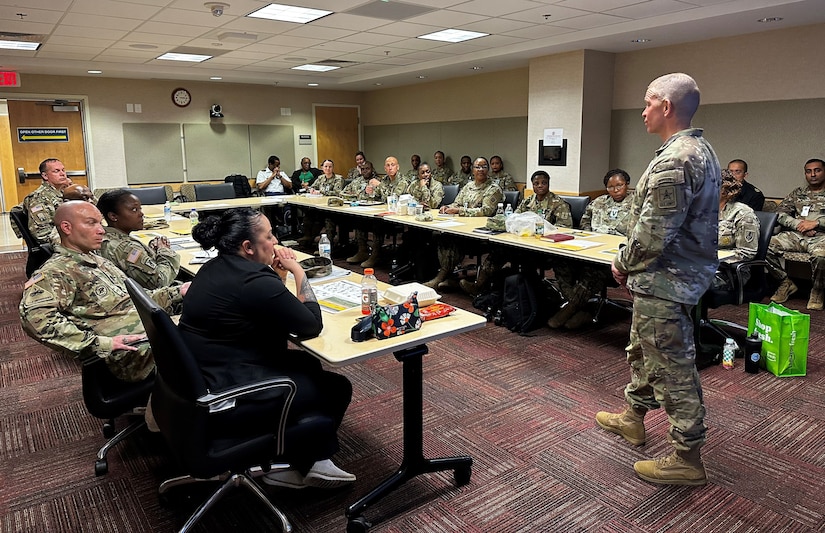 Sgt. Maj. of the Army Michael Grinston speaks with sergeants major of the Finance and Comptroller Corps during a symposium at the Pentagon, March 17, 2023. The three-day symposium offered an opportunity for OASA (FM&C) leaders and others to meet with the senior noncommissioned officers, and discuss items such as the Army budget process, financial information systems, the Army audit and workforce development. (U.S. Army photo by Sgt. 1st Class William Reinier) (Photo Credit: Sgt. 1st Class William Reinier)