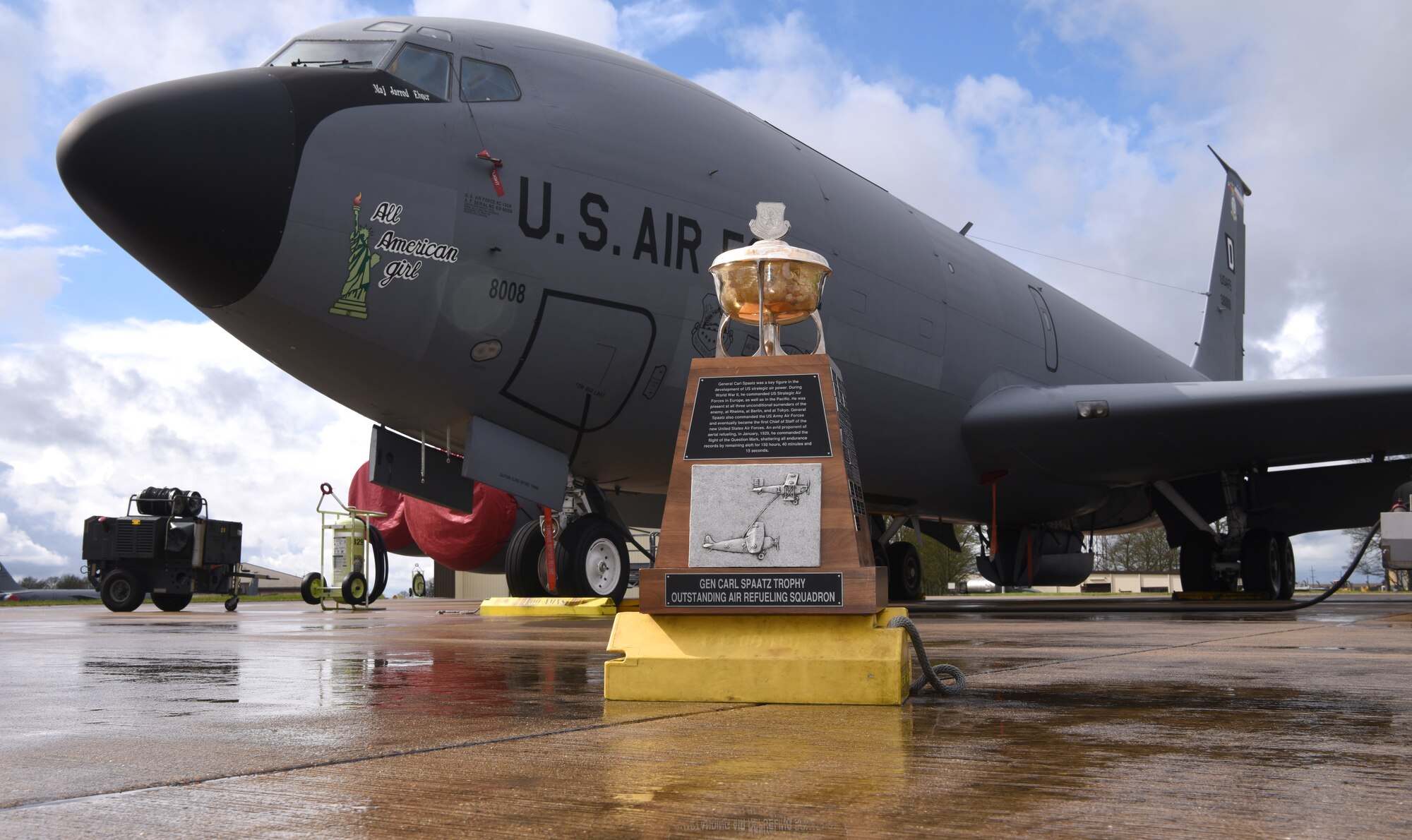 The Gen. Carl A Spaatz Trophy is displayed by a KC-135 Stratotanker aircraft after being awarded to the 351st Air Refueling Squadron for winning “Outstanding Air Refueling Squadron 2022” and “Best in Air Force” at Royal Air Force Mildenhall, England, March 31, 2023. The squadron earned the prestigious trophy by proving themselves to be Number 1 out of 59 air refueling squadrons within the U.S. Air Force.  The 351st ARS exceeded Air Mobility Command’s goal by 1,783 hours and ensuring 120 aircrew upgrades in 2022. (U.S. Air Force photo by Karen Abeyasekere)