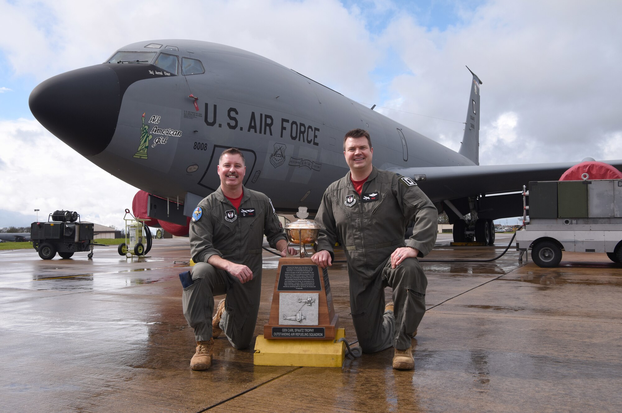 U.S. Air Force Senior Master Sgt. Christopher Staton, left, 351st Air Refueling Squadron senior enlisted leader, and Lt. Col. Tyler Berge, 351st ARS commander, proudly show off the hard-won Gen. Carl A. Spaatz Trophy for “Best Air Refueling Squadron” and “Best in Air Force” earned for 2022 at Royal Air Force Mildenhall, England, March 31, 2023. The long list of accomplishments which earned the 351st ARS the prestigious trophy included the delivery of a strategic airbridge amidst the Russian War in Ukraine, refueling Air Mobility command and 352nd Special Operations Wing assets for time-critical evacuations of the Ukranian and Ethiopian Embassies, ultimately bringing home 672 American citizens. (U.S. Air Force photo by Karen Abeyasekere)