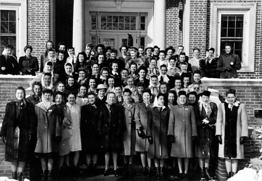 Newly-arrived WAVES pose in front of the Iowa State Teachers College in Cedar Falls, Iowa, January 1943. Image courtesy Naval History and Heritage Command (NH 95372).