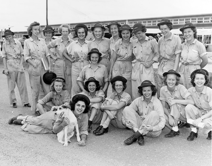 Members of the first class of WAVES to graduate from the Aviation Metalsmith School at the Naval Air Technical Training Center in Norman, Oklahoma, 30 July 1943. Image courtesy Naval History and Heritage Command (NH 95359).