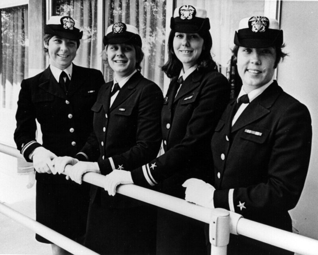 In 1974 the U.S. Navy designated its first female naval aviators, four of whom posed for a photograph during their flight instruction. Pictured left to right are Ensign Rosemary Conaster (later Mariner), Ensign Jane Skiles, Lieutenant (j.g.) Barbara Allen, and Lieutenant (j.g.) Judith Neuffer. Allen, the first to receive her wings, was killed in a training accident in 1982, the other three officers eventually retired as captains. Image courtesy Naval History and Heritage Command.