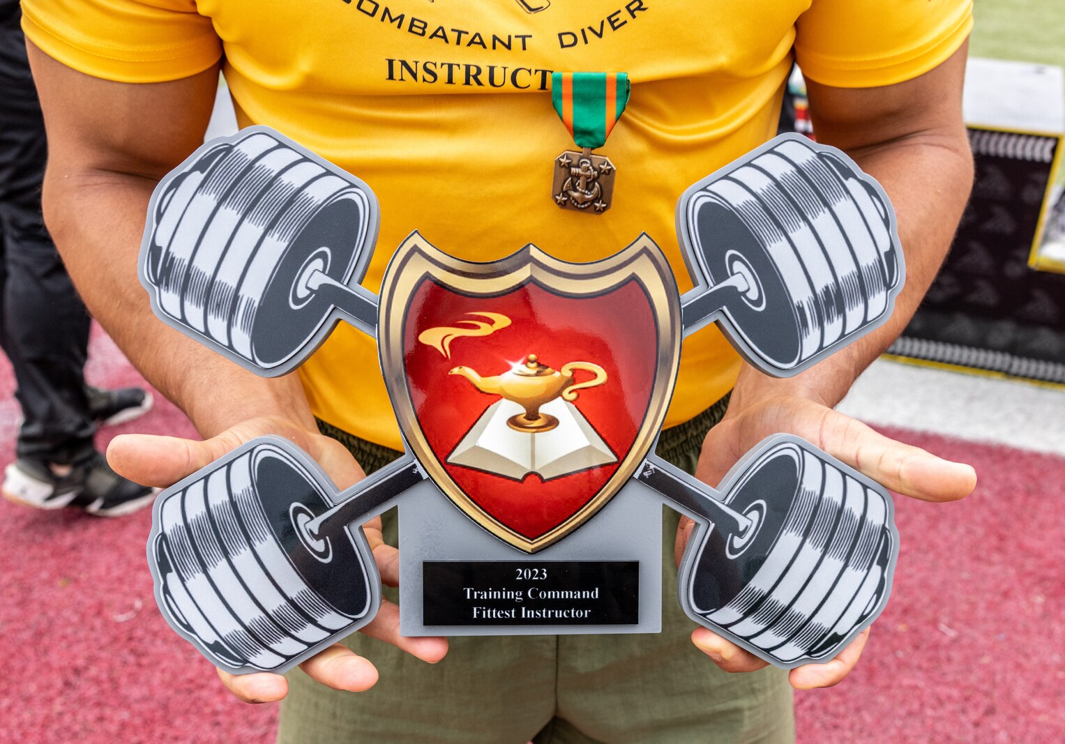 U.S. Marine Corps Sgt. Christopher J. Martin, an instructor with Marine Combatant Dive Detachment, Marine Aviation Training Support Group 21, Panama City, Florida, poses for a photo during the awards ceremony for the first Training Education Command Fittest Instructor Competition on Marine Corps Base Quantico, Virginia, April 14, 2023. The competitors underwent four days of competition that pushed each of them to their physical and mental limits. They learned that fitness is a skill that needs to be learned, practiced and maintained. (U.S. Marine Corps Photo by Lance Cpl. Kayla LeClaire)