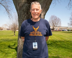 Longtime Air Force Marathon volunteer David Pfister prepares for the annual event at Wright-Patterson Air Force Base, Ohio, April 11, 2023. Pfister has volunteered for each marathon since its start in 1997. (U.S. Air Force photo by Sarah Amato)