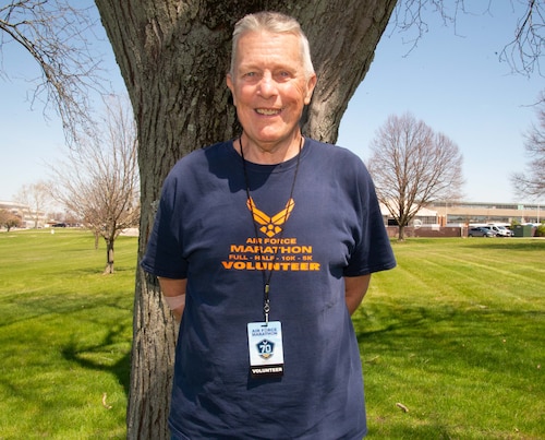 Longtime Air Force Marathon volunteer David Pfister prepares for the annual event at Wright-Patterson Air Force Base, Ohio, April 11, 2023. Pfister has volunteered for each marathon since its start in 1997. (U.S. Air Force photo by Sarah Amato)