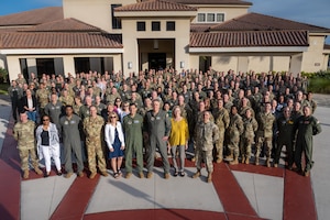 Total Force Mobility Air Force leaders pose for a group photo during Phoenix Rally at MacDill Air Force Base, Florida, April 19, 2023. Spring Phoenix Rally brought together more than 250 Total Force Mobility Air Force leaders and spouses to discuss Warrior Heart, Mobility Guardian ’23, Air Mobility Command's strategy and priorities, and how to work together to ensure the Mobility Air Force is ready to deliver Rapid Global Mobility across the Joint Force. (U.S. Air Force photo by Airman 1st Class Zachary Foster)