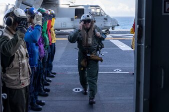 Commander, Carrier Strike Group 4 Rear Adm. Jeffrey Czerewko arrives aboard the Wasp-class amphibious assault ship USS Bataan (LHD 5), April 16. Bataan, along with the San Antonio-class amphibious transport dock ship USS Mesa Verde (LPD 19) and the Harpers Ferry-class dock landing ship USS Carter Hall (LSD 50), is participating in the Bataan Amphibious Ready Group and 26th Marine Expeditionary Unit exercise (ARGMEUEX).