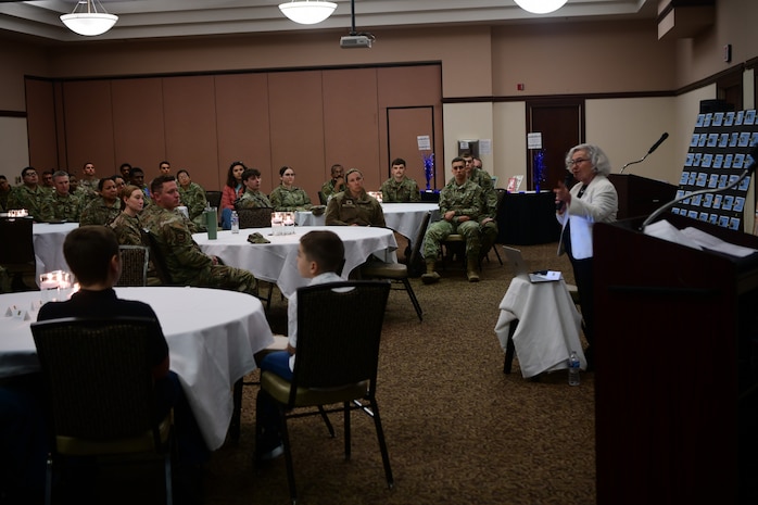 Elizabeth Igra, retired veteran educator, gives a speech at the Recce Point Club on Beale Air Force Base, California on April 18, 2023.
