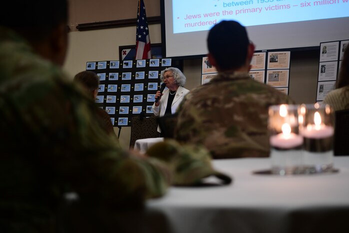 Elizabeth Igra, retired veteran educator, gives a speech at the Recce Point Club on Beale Air Force Base, California, on April 18, 2023