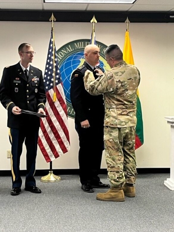 Lithuania air force Capt. Matas Leckas and Capt. Valius Urbonas became the first Lithuanian pilots to graduate from the UH-60M Aviator Qualification Course at the U.S. Army Aviation Center of Excellence during a ceremony at Fort Novosel, Alabama, then known as Fort Rucker, April 4, 2023. (U.S. Army National Guard photo by Maj. Michael Bertsch)
