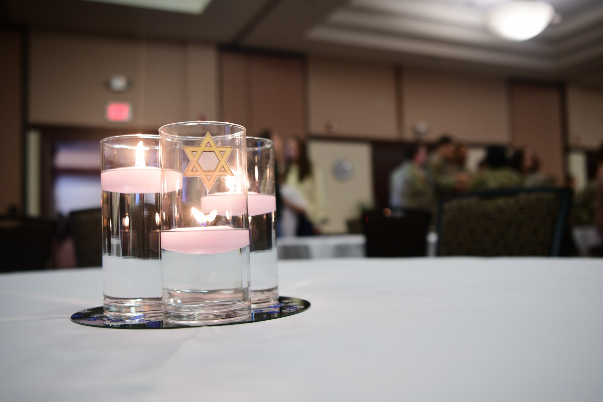 A centerpiece is displayed on a table for the Holocaust Remembrance event at the Recce Point Club on Beale Air Force Base, California, on April 18, 2023.