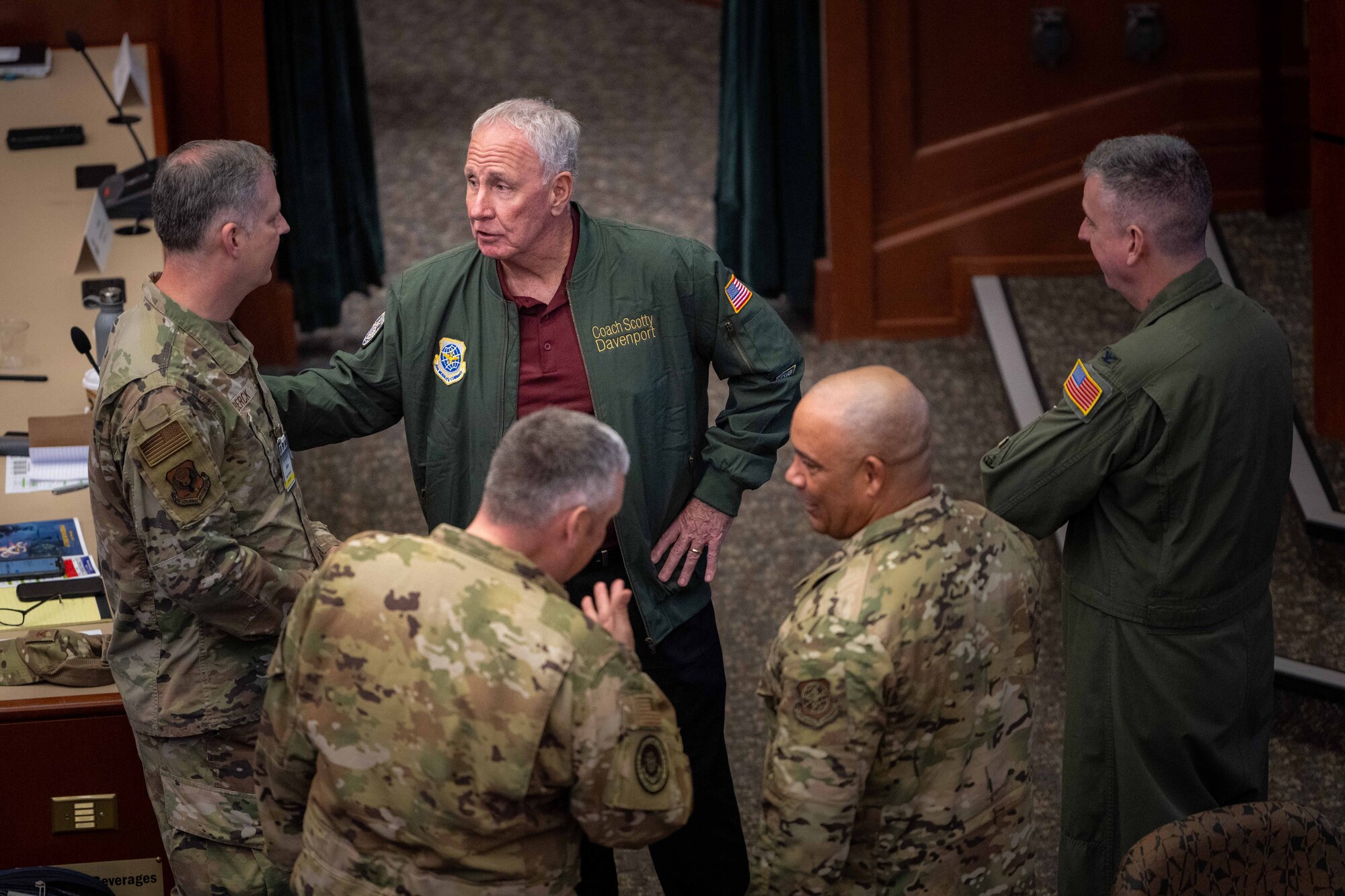 Scott Davenport, Bellarmine Knights Men’s Basketball head coach and keynote speaker, speaks with Total Force Mobility Air Force leaders during the Phoenix Rally conference at MacDill Air Force Base, Florida, April 17, 2023. Davenport shared his experience turning a losing team into a national champion and the fundamental changes that brought his success. (U.S. Air Force photo by Airman 1st Class Zachary Foster)