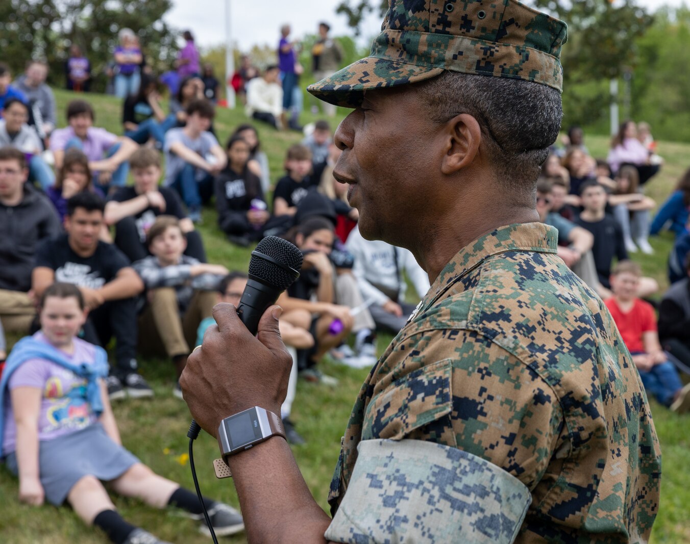 U.S. Marine Corps Col. Michael Brooks, base commander, Marine Corps Base Quantico, addresses students, thanking them for their contributions as members of a military family, during the Month of the Military Child at Quantico Middle High School, MCBQ, Virginia, April 14, 2023. April is designated as Month of the Military Child, which highlights the important role military children play in the Armed Forces community. (U.S. Marine Corps photo by Lance Cpl. Jeffery Stevens)