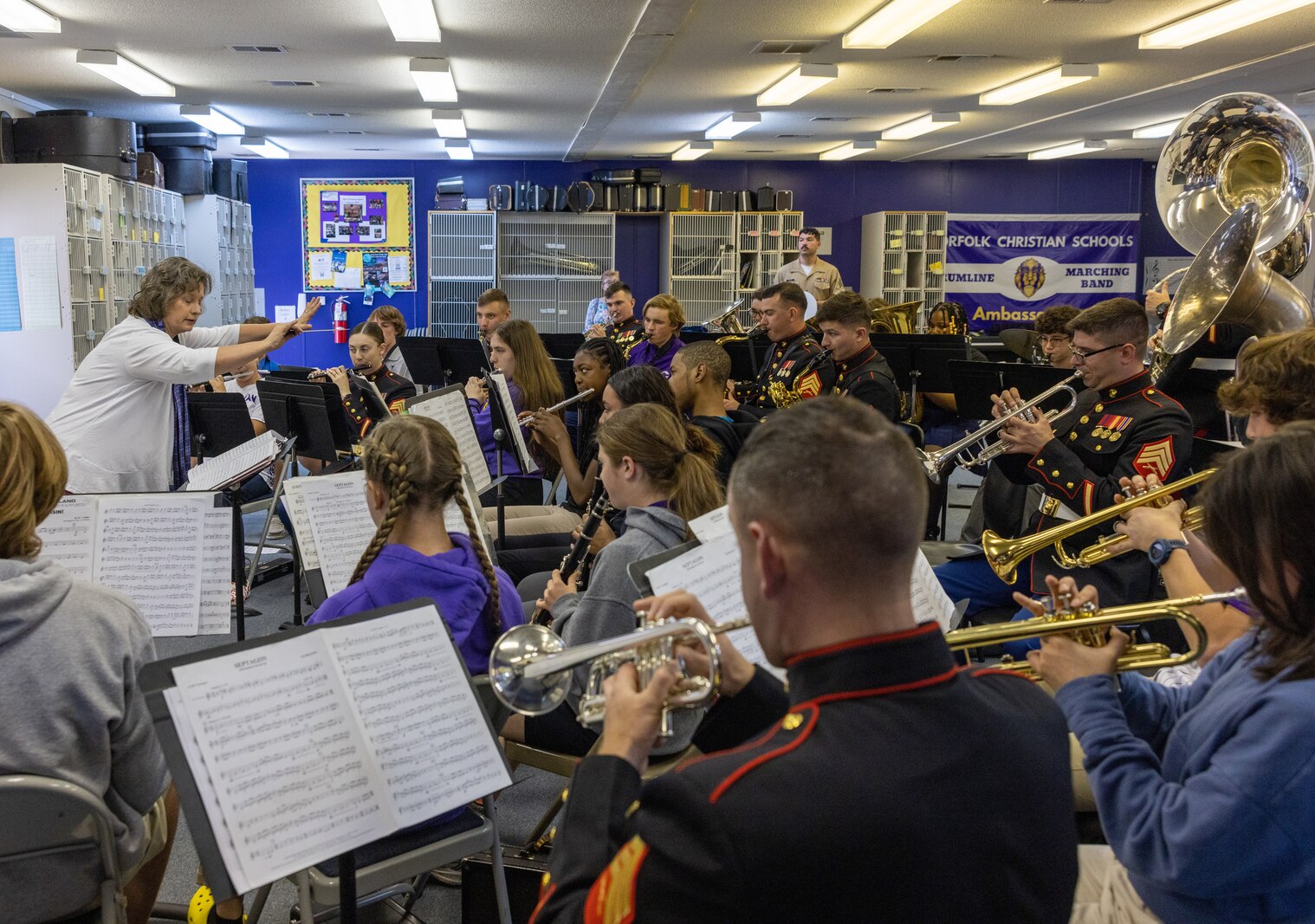 U.S. Marines with the Quantico Marine Corps Band practices concert music with the band at Norfolk Christian Schools in Norfolk, Virginia, April 17, 2023. The Marines assisted students by integrating into each instrumental section and playing alongside them in order to strengthen their musical skills. (U.S. Marine Corps Photo by Lance Cpl. Kayla LeClaire)