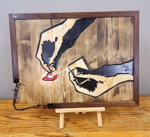 Pine, walnut, salvaged barbed wire, and epoxy art inspired by the true story of Lale Sokolov as told by Heather Morris in The Tattooist of Auschwitz.