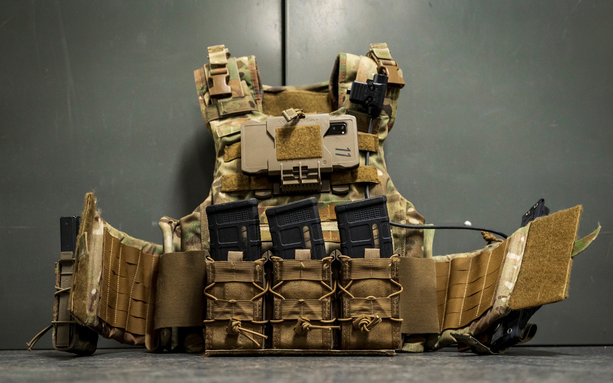 A tactical vest leans against a locker in a barracks bay at Camp Navajo, Arizona, April 10, 2023.