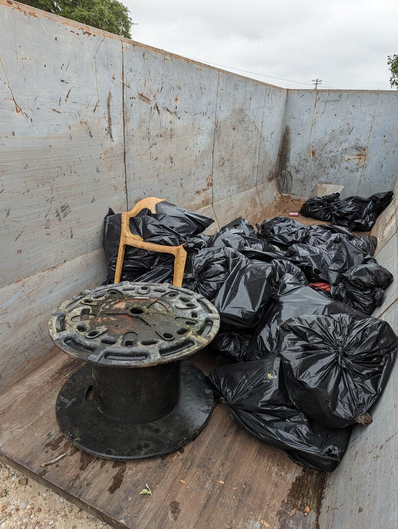 Volunteers clean up Salado Creek at JBSA-Fort Sam Houston for Earth Day
