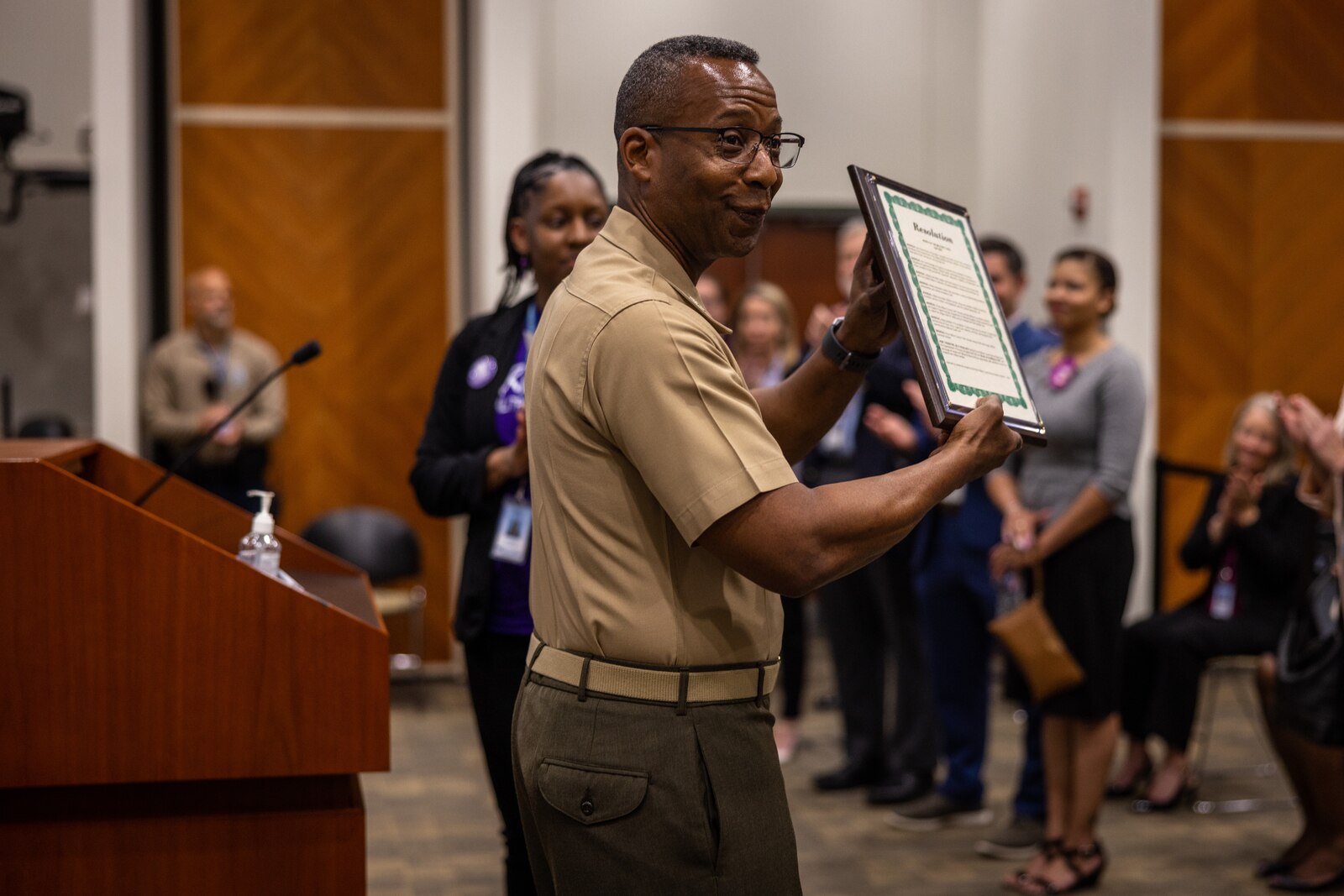 U.S. Marine Corps Col. Michael L. Brooks, base commander, Marine Corps Base Quantico, center, presents the proclamation during the Month of the Military Child Proclamation presentation at Edward L. Kelly Leadership Center, Manassas, Virginia, April 19, 2023. Brooks addressed the school boards of Prince William, Stafford and Fredericksburg to share his gratitude for the hard work each district has put into their “go purple” initiative to support military connected students. (U.S. Marine Corps photo by Lance Cpl. Joaquin Dela Torre)