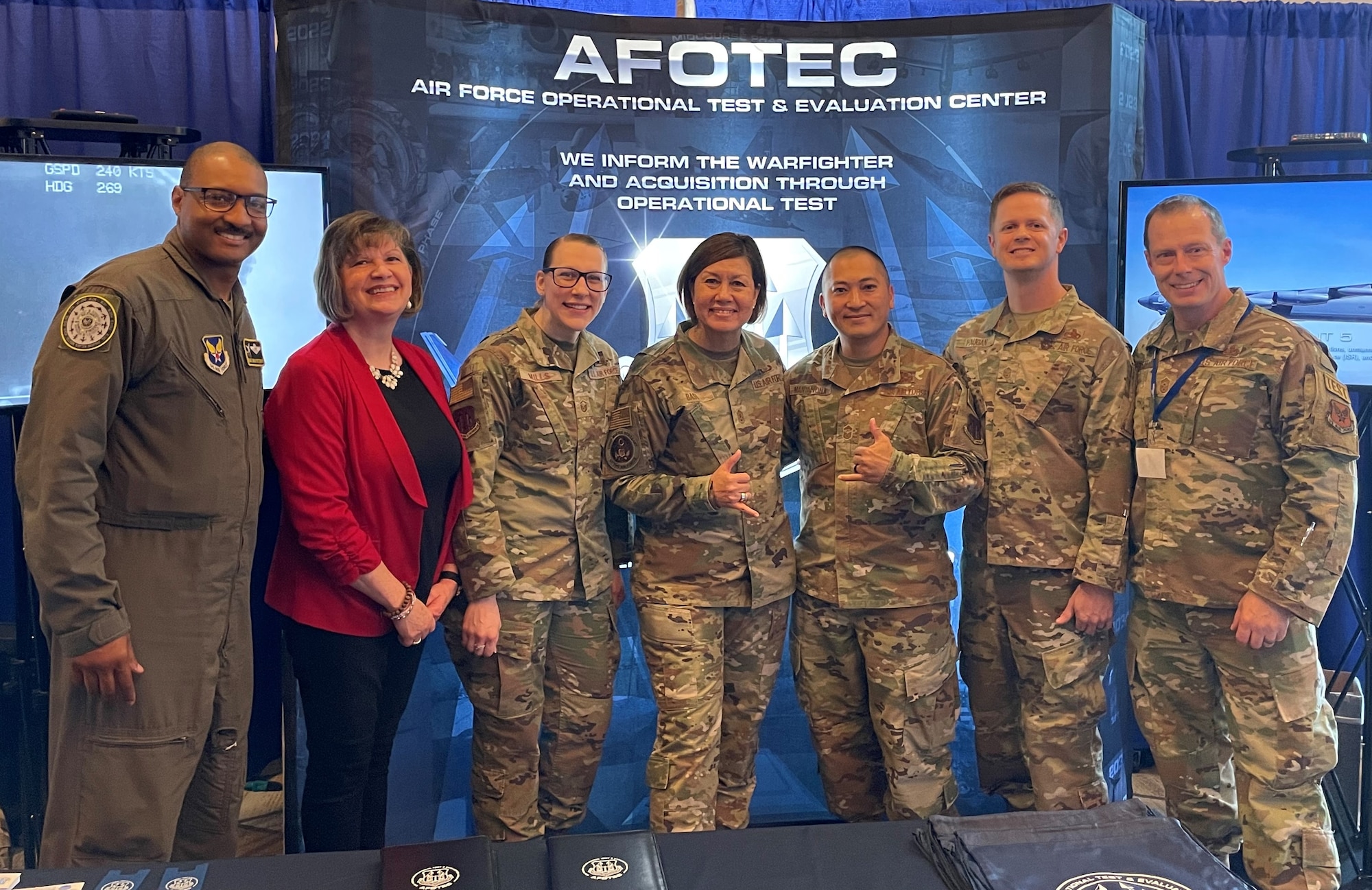 Chief Master Sergeant of the Air Force JoAnne Bass visits the Air Force Operational Test and Evaluation Center Display team at the 2022 Air Force Sergeants’ Association Professional Education and Development Symposium held in San Antonio, Texas. Display team members include (left to right) SMSgt. Brian Pettaway, Katherine Gandara, MSgt. Michelle Mills, SMSgt. Matthew Mantanona, MSgt. Sean Haugen, and AFOTEC Command Chief CMSgt. Christopher Griste.