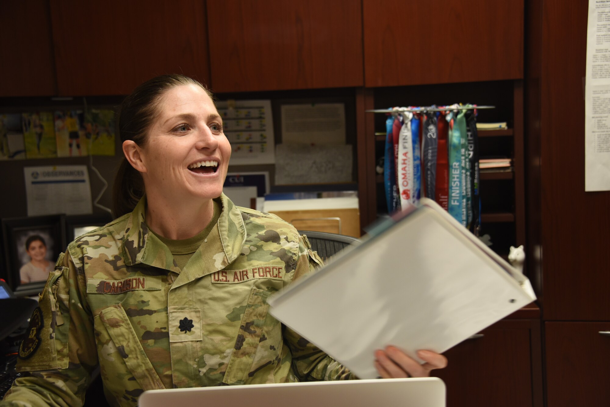 Lt. Col. Jennifer Carlson performs administrative duties