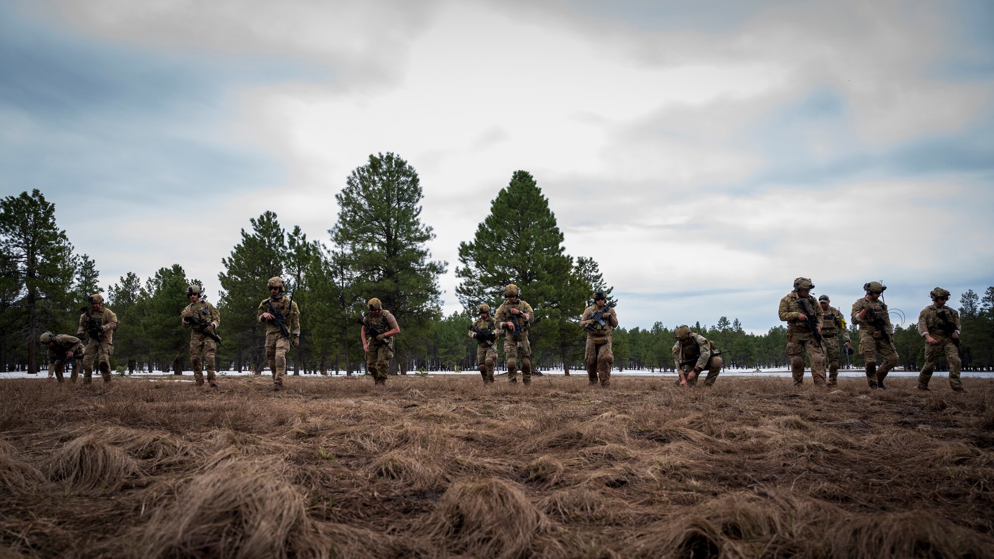 U.S. Air Force Airmen assigned to the 56th Civil Engineer Squadron Explosive Ordnance Disposal flight, practice a rapid explosive hazard mitigation during a training scenario at Camp Navajo, Arizona, April 12, 2023.