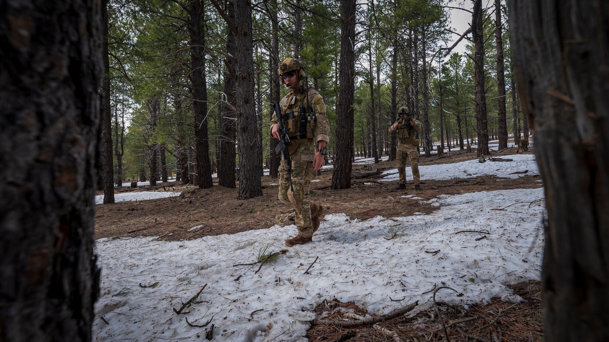U.S. Air Force Tech. Sgt. Tyler Paul, 56th Civil Engineer Squadron Explosive Ordnance Disposal flight technician, investigates an area outside a mock village during a training scenario at Camp Navajo, Arizona, April 12, 2023.