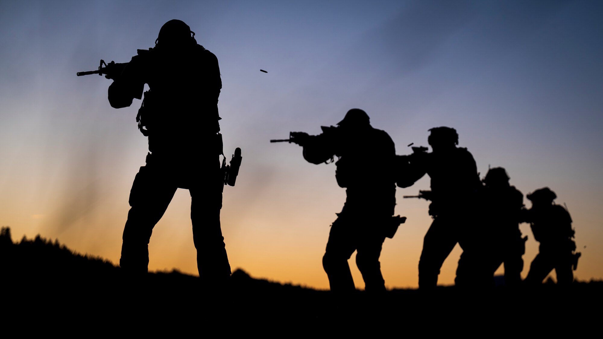 U.S. Air Force members assigned to the 56th Civil Engineer Squadron Explosive Ordnance Disposal flight fire M4 carbine assault rifles on a firing range at Camp Navajo, Arizona, April 10, 2023.