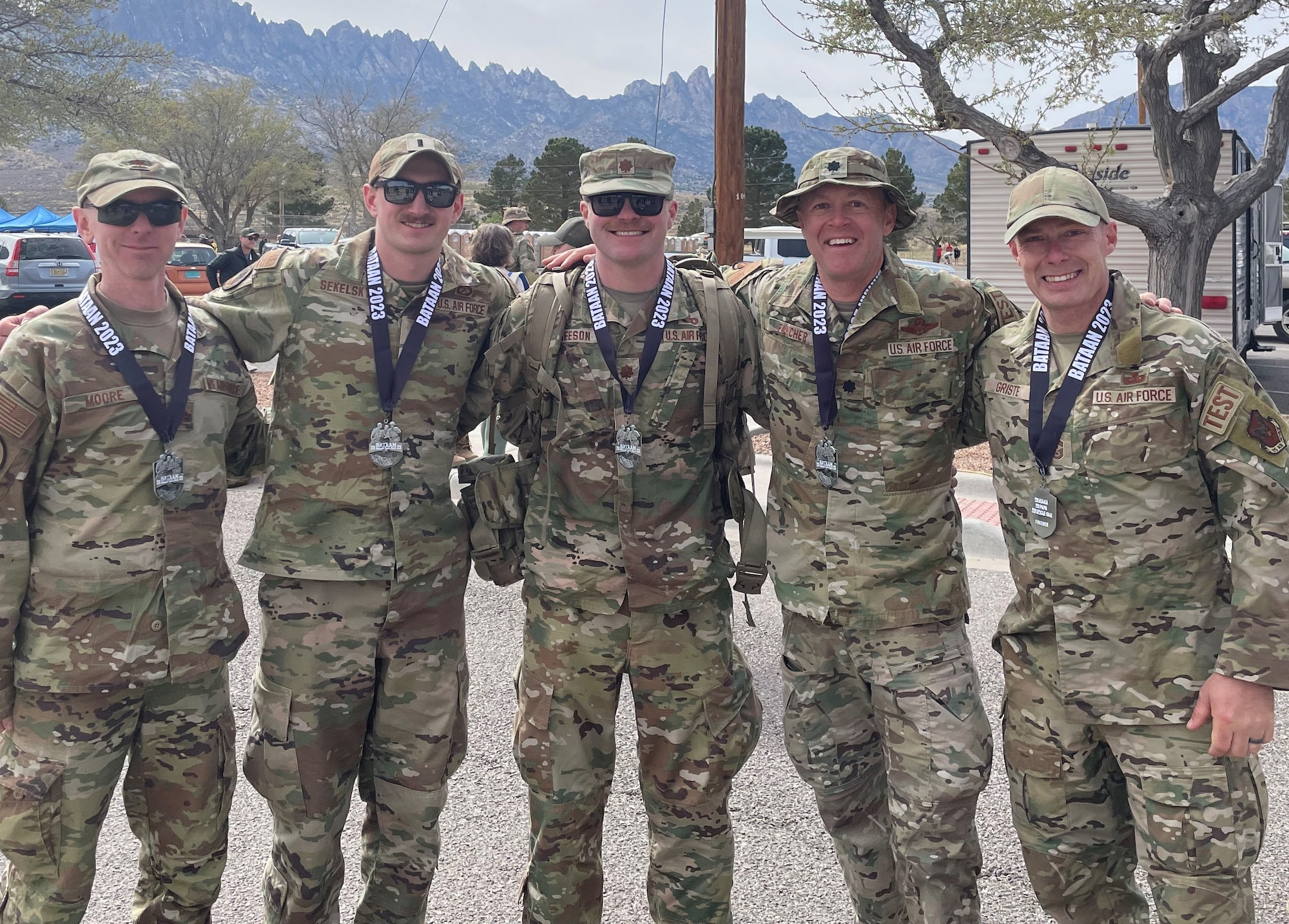 Air Force Operational Test and Evaluation Center team members participated in the 34th Annual Bataan Memorial Death March held at White Sands Missile Range, N.M. The more than 26-mile march is held annually to commemorate service members who defended the Philippine Islands during World War II. Some of the AFOTEC team members included (left to right) Maj. Christopher Moore, 1st Lt. Alec Sekelsky, Maj. Joel Greeson, Lt. Col. Eric Fancher, and AFOTEC Command CMSgt. Christopher Griste.