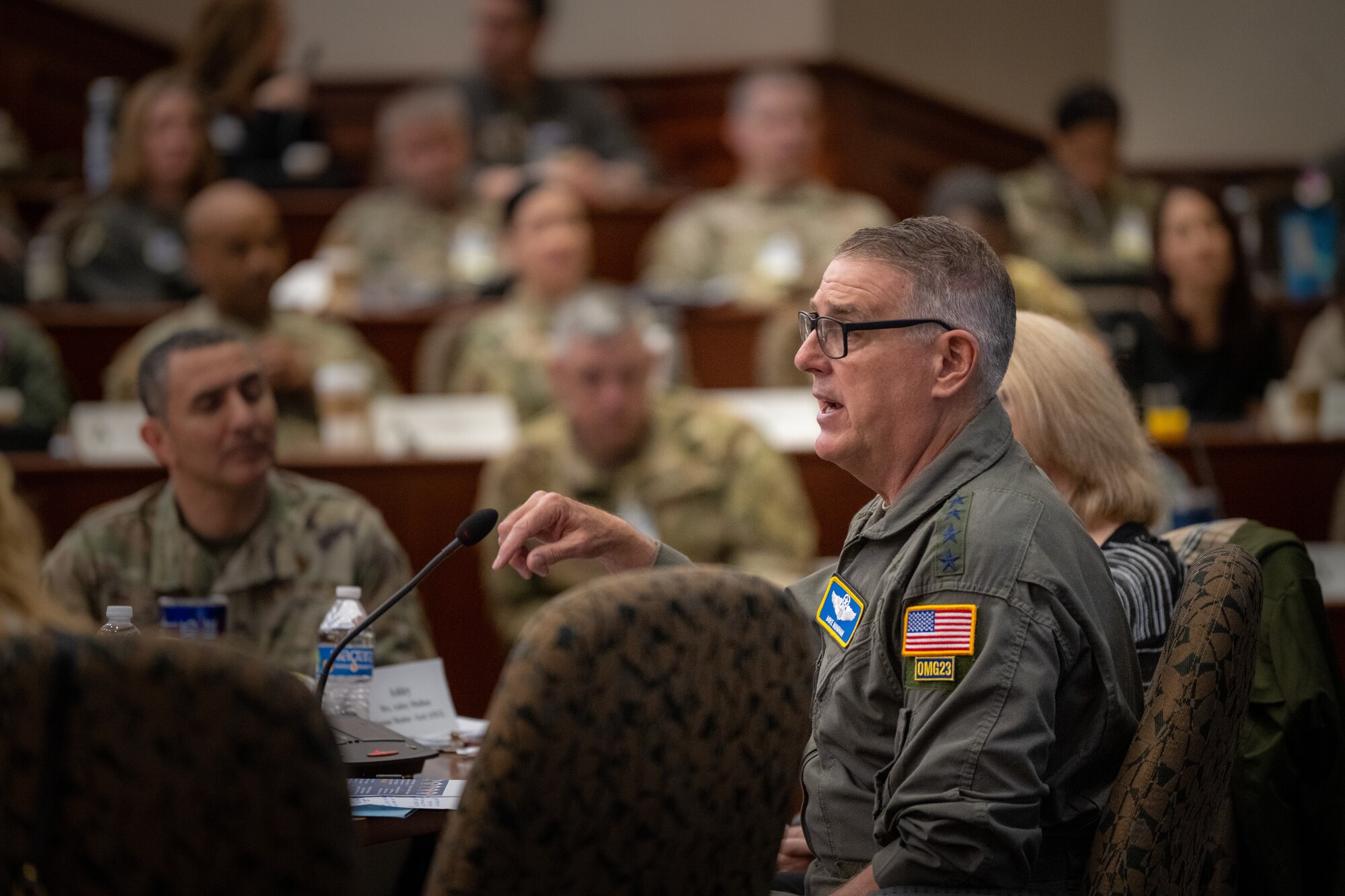 U.S. Air Force Gen. Mike Minihan, commander of Air Mobility Command, answers questions during the Phoenix Rally conference at MacDill Air Force Base, Florida, April 17, 2023. Spring Phoenix Rally brought together more than 250 Total Force Mobility Air Force leaders and spouses to discuss Warrior Heart, Mobility Guardian ’23, Air Mobility Command's strategy and priorities, and how to work together to ensure the Mobility Air Force is ready to deliver Rapid Global Mobility across the Joint Force. (U.S. Air Force photo by Airman 1st Class Zachary Foster)