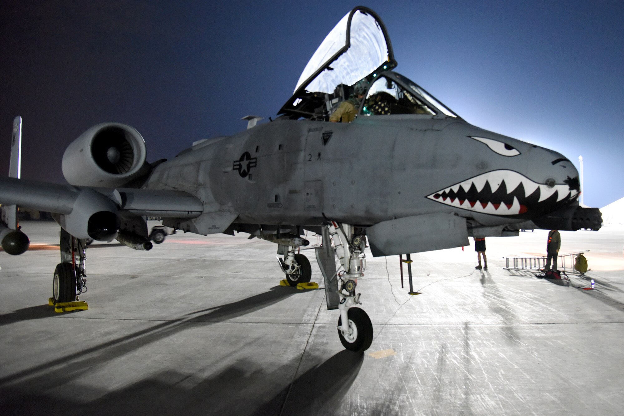U.S. Air Force 1st Lt Pablo Manceuax, 75th Expeditionary Fighter Squadron A-10 Thunderbolt II pilot, goes through his pre-flight check list before a combat sortie out of Al Dhafra Air Base, United Arab Emirates, April 20, 2023. The deployment of A-10s provides additional capabilities in tandem with other fighter aircraft throughout the region. (U.S. Air Force photo by Tech. Sgt. Chris Jacobs/released)