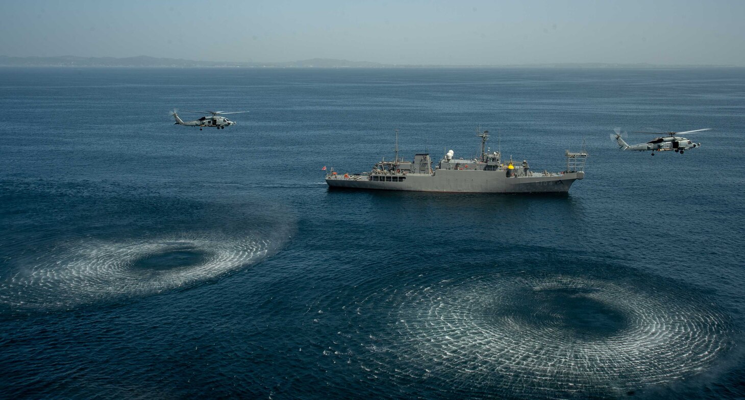 MH-60R Seahawks attached to the “Saberhawks” of Helicopter Maritime Strike Squadron (HSM) 77 flies alongside the Futami-class research ship JS Wakasa (AGS-5104) in Sagami Bay, Japan, April 13, 2023. The Saberhawks are forward-deployed to the 7th Fleet area of operation in support of a free and open Indo-pacific. (U.S. Navy photo by Mass Communication Specialist 2nd Class Askia Collins)