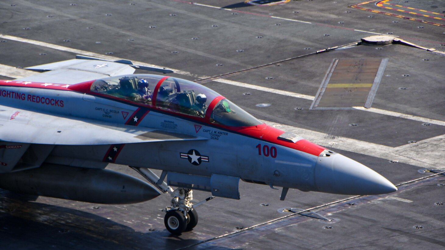 U.S. Navy Capt. Craig Sicola, commanding officer of the aircraft carrier USS Nimitz (CVN 68), front seat, and Cmdr. Luke Edwards, commanding officer of the “Fighting Redcocks” of Strike Fighter Squadron (VFA) 22, taxi across the flight deck of Nimitz in an F/A-18F Super Hornet from VFA-22. Nimitz is in U.S. 7th Fleet conducting routine operations. 7th Fleet is the U.S. Navy's largest forward-deployed numbered fleet, and routinely interacts and operates with allies and partners in preserving a free and open Indo-Pacific region. (U.S. Navy photo by Mass Communication Specialist 3rd Class Emma Burgess)