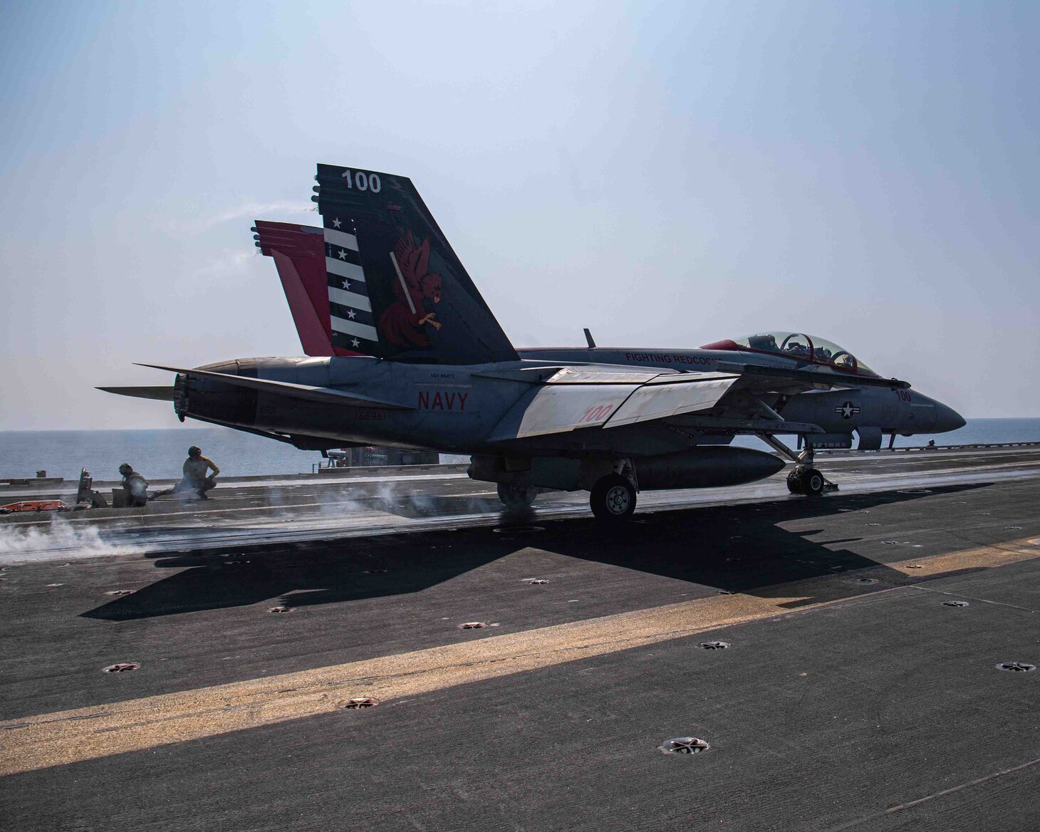 U.S. Navy Capt. Craig Sicola, commanding officer of the aircraft carrier USS Nimitz (CVN 68), front seat, and Cmdr. Luke Edwards, commanding officer of the “Fighting Redcocks” of Strike Fighter Squadron (VFA) 22, launch from the flight deck of Nimitz in an F/A-18F Super Hornet from VFA-22. Nimitz is in U.S. 7th Fleet conducting routine operations. 7th Fleet is the U.S. Navy's largest forward-deployed numbered fleet, and routinely interacts and operates with allies and partners in preserving a free and open Indo-Pacific region. (U.S. Navy photo by Mass Communication Specialist 2nd Class Joseph Calabrese)