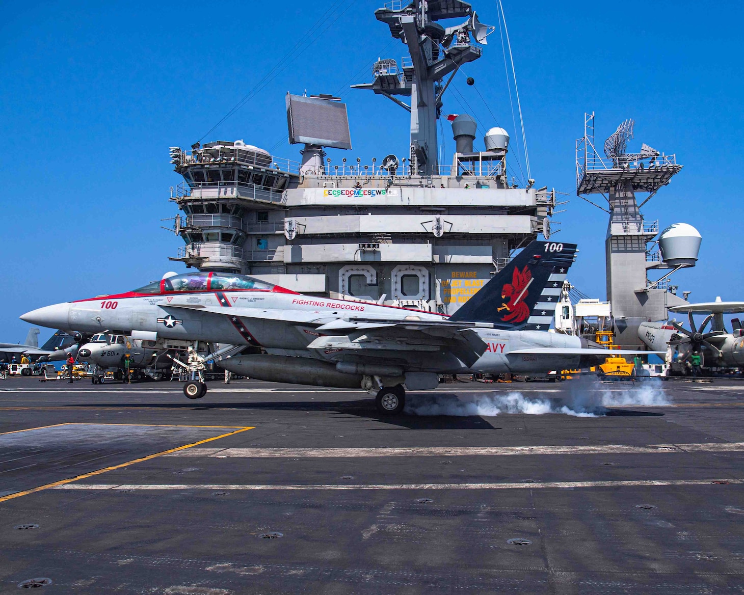 U.S. Navy Capt. Craig Sicola, commanding officer of the aircraft carrier USS Nimitz (CVN 68), front seat, and Cmdr. Luke Edwards, commanding officer of the “Fighting Redcocks” of Strike Fighter Squadron (VFA) 22, make an arrested landing in an F/A-18F Super Hornet from VFA-22 marking the 350,000th time the carrier has landed a fixed-wing aircraft on its flight deck. Nimitz is in U.S. 7th Fleet conducting routine operations. 7th Fleet is the U.S. Navy's largest forward-deployed numbered fleet, and routinely interacts and operates with allies and partners in preserving a free and open Indo-Pacific region. (U.S. Navy photo by Mass Communication Specialist 2nd Class Joseph Calabrese)