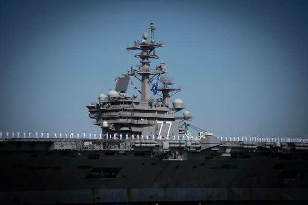 NORFOLK, Va. (April 23, 2023) The Nimitz-class aircraft carrier USS George H.W. Bush (CVN 77), along with the staff of carrier Strike Group (CSG) 10, returns to Naval Station Norfolk following an eight-month deployment, April 23, 2023. The George H.W. Bush CSG was deployed to the U.S. Naval Forces Europe area of operations, employed by U.S. Sixth Fleet to defend U.S., allied and partner interests. (U.S. Navy photo by Mass Communication Specialist 2nd Class Anderson W. Branch)