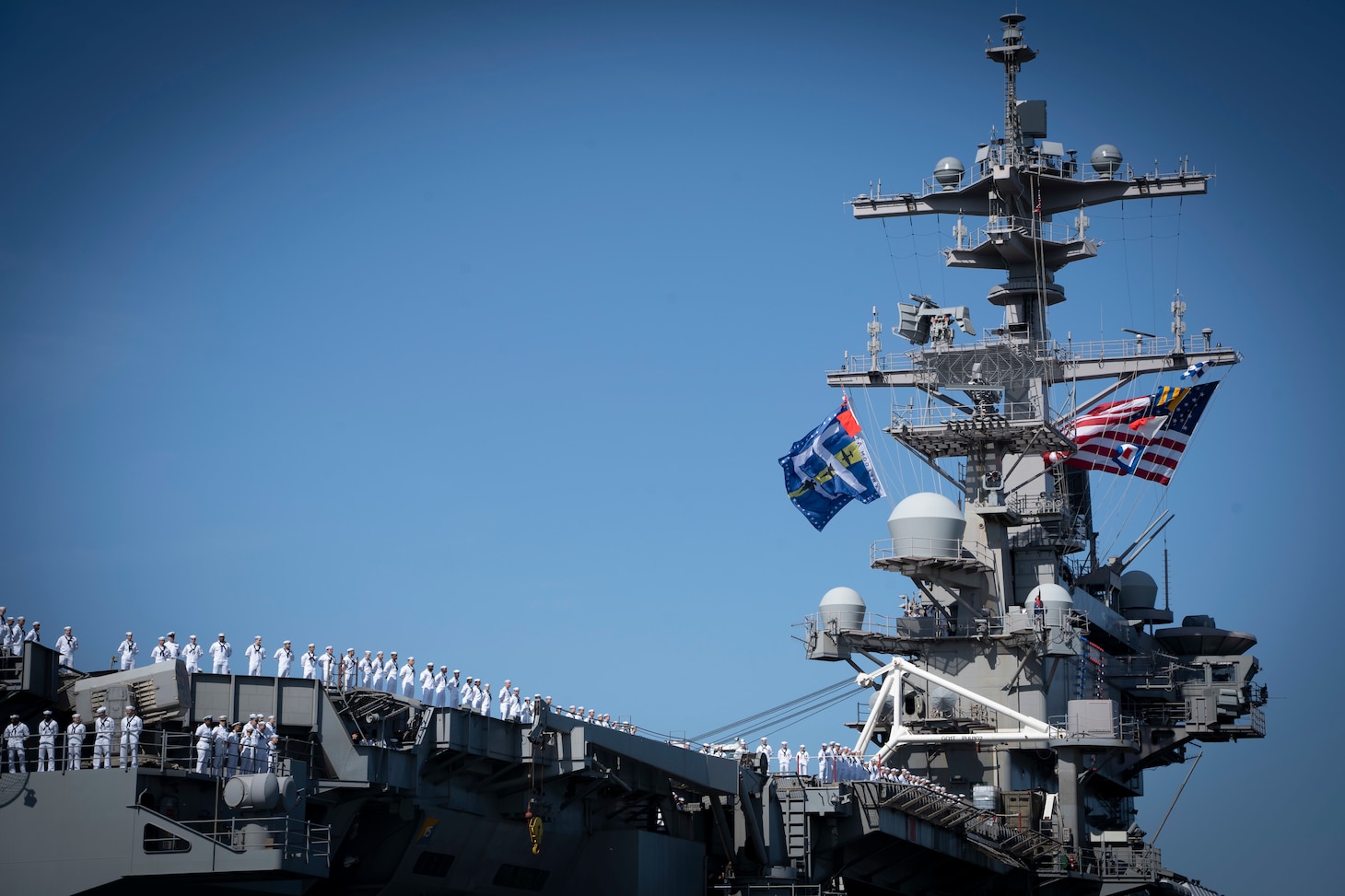 NORFOLK, Va. (April 23, 2023) The Nimitz-class aircraft carrier USS George H.W. Bush (CVN 77), along with the staff of carrier Strike Group (CSG) 10, returns to Naval Station Norfolk following an eight-month deployment, April 23, 2023. The George H.W. Bush CSG was deployed to the U.S. Naval Forces Europe area of operations, employed by U.S. Sixth Fleet to defend U.S., allied and partner interests. (U.S. Navy photo by Mass Communication Specialist 2nd Class Anderson W. Branch)