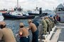 PORT EVERGLADES, Fla. (April 23, 2023) Sailors assigned to the Arleigh Burke-class guided-missile destroyer USS Cole (DDG 67) watch as the Virginia-class fast-attack submarine USS Indiana (SSN 789) arrives in port for Fleet Week Port Everglades in Fort Lauderdale, Fla. This year marks the 32nd Port Everglades Fleet Week. Fleet Week has been hosted by Broward Navy Days and other military support organizations since 1990, interrupted by COVID in 2020 and 2021. (U.S. Navy photo by Mass Communication Specialist 2nd Class Zachary D. Behrend)