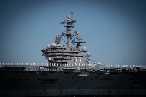 NORFOLK, Va. (April 23, 2023) The Nimitz-class aircraft carrier USS George H.W. Bush (CVN 77), along with the staff of carrier Strike Group (CSG) 10, returns to Naval Station Norfolk following an eight-month deployment, April 23, 2023. The George H.W. Bush CSG was deployed to the U.S. Naval Forces Europe area of operations, employed by U.S. Sixth Fleet to defend U.S., allied and partner interests. (U.S. Navy photo by Mass Communication Specialist 2nd Class Anderson W. Branch)